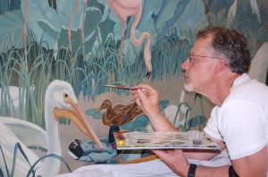 Scott M. Haskins inpainting a mural by Jessie Botke